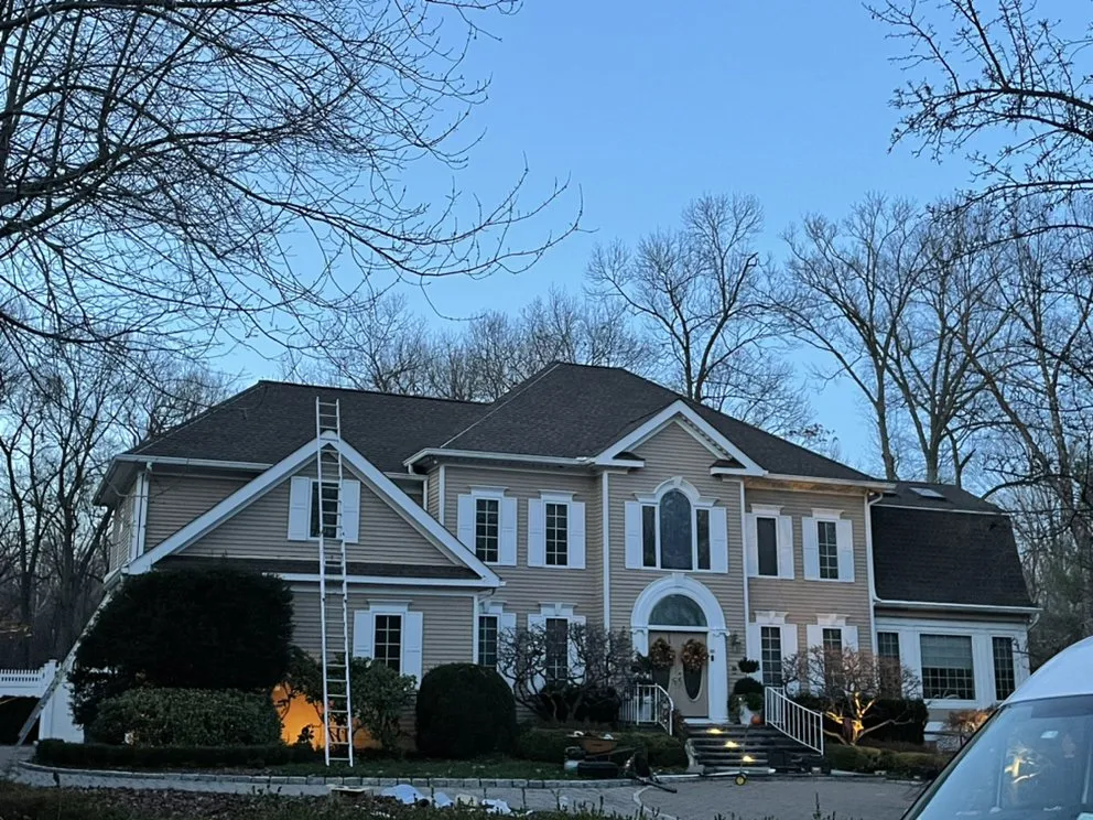 Slide of LE All Season Roofing & Siding