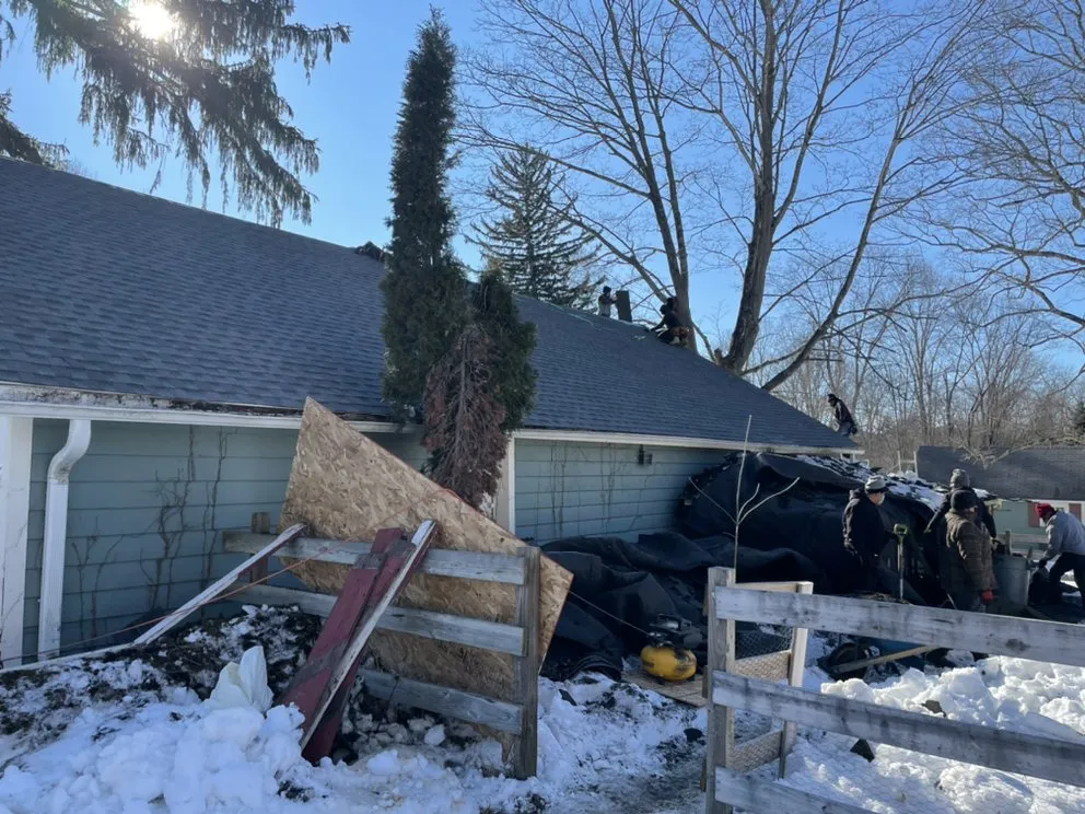 Slide of LE All Season Roofing & Siding