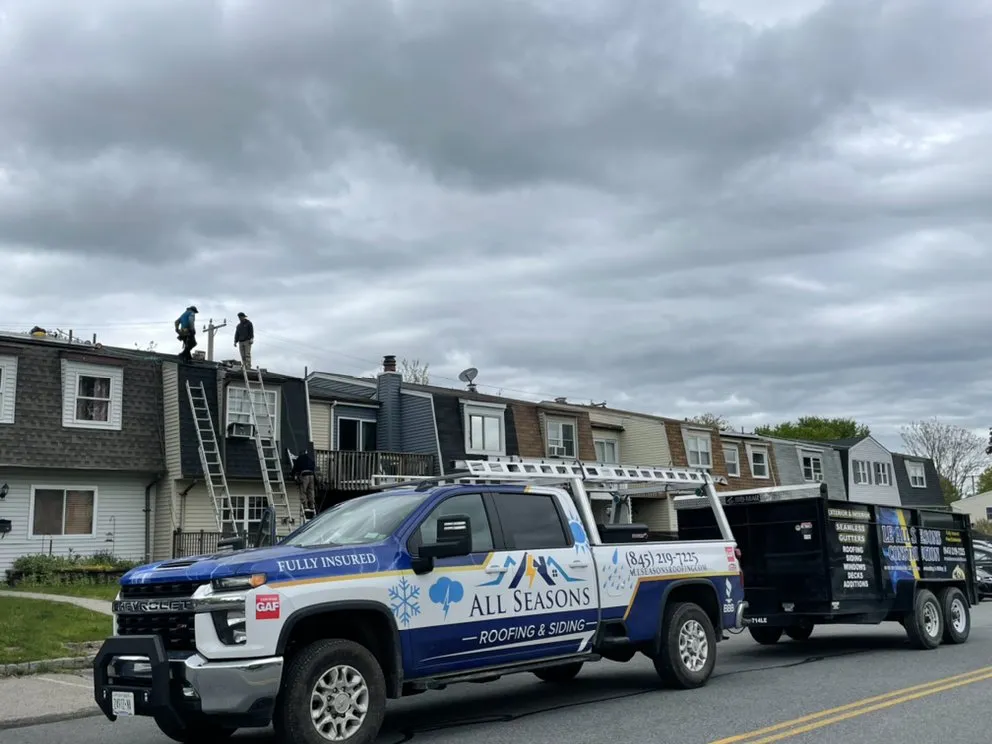 Slide of LE All Season Roofing & Siding