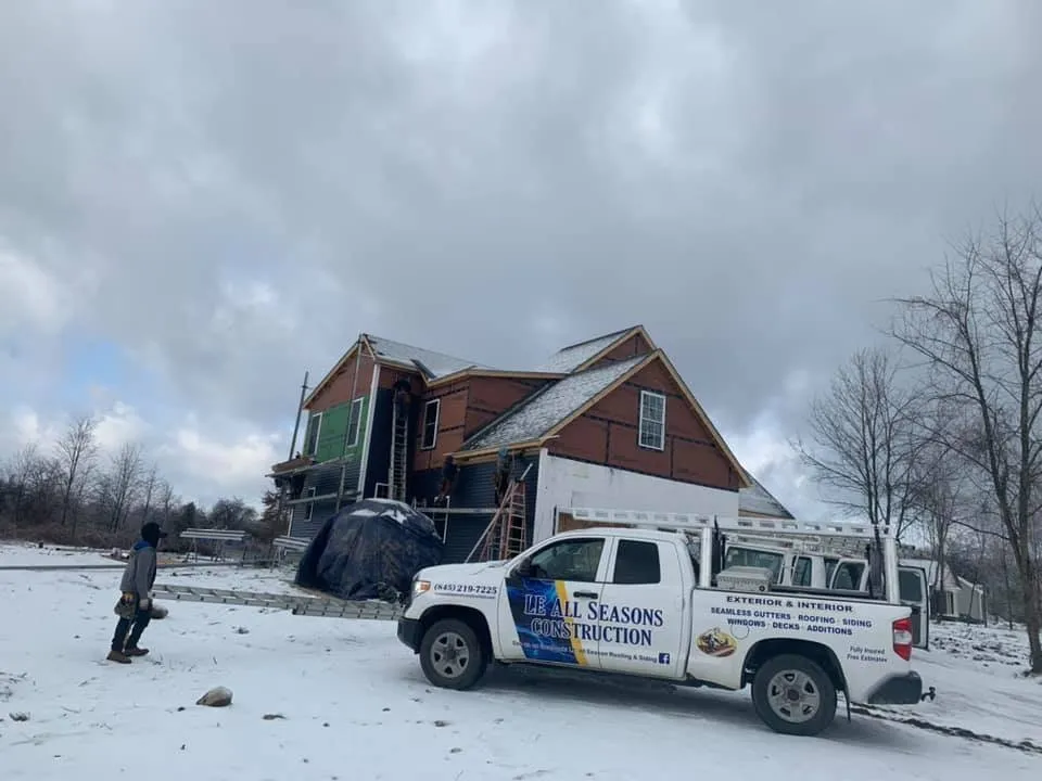 Slide of LE All Season Roofing & Siding