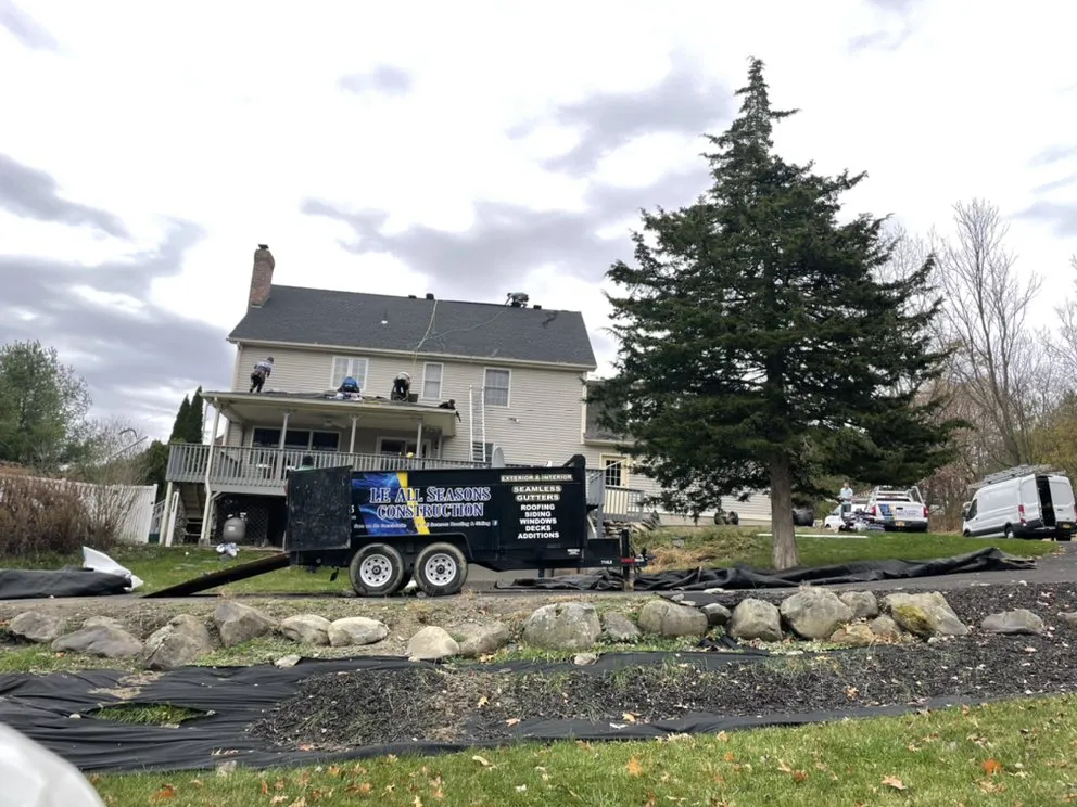 Slide of LE All Season Roofing & Siding