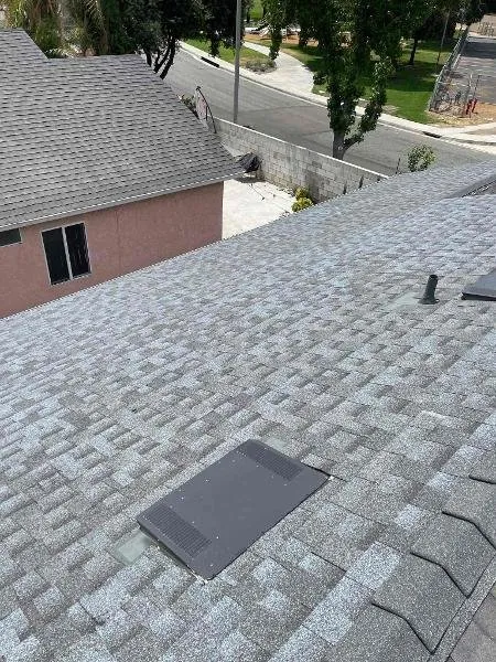 Slide of LE Roofing