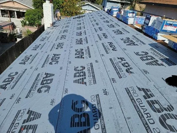 Slide of LE Roofing