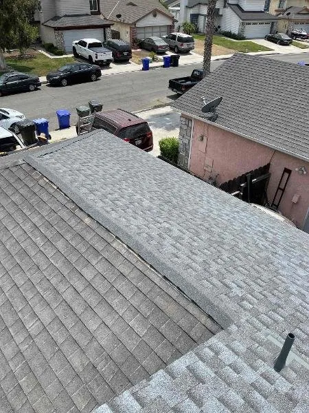Slide of LE Roofing