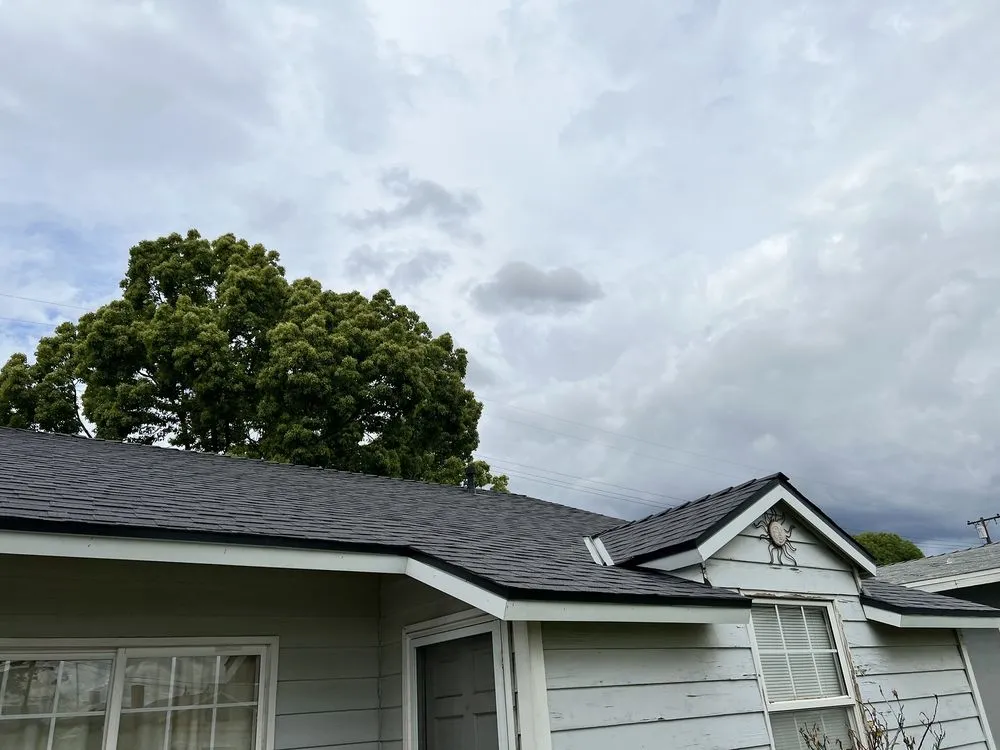 Slide of Leach Roofing Company