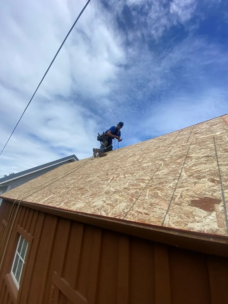 Slide of Leadher Roofing Contractors