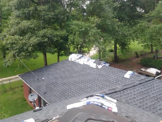 Leak Proof Roofing Logo