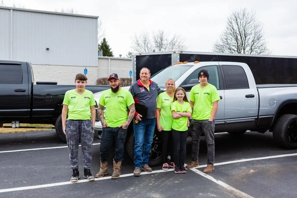 Slide of Lee and Sons Roofing
