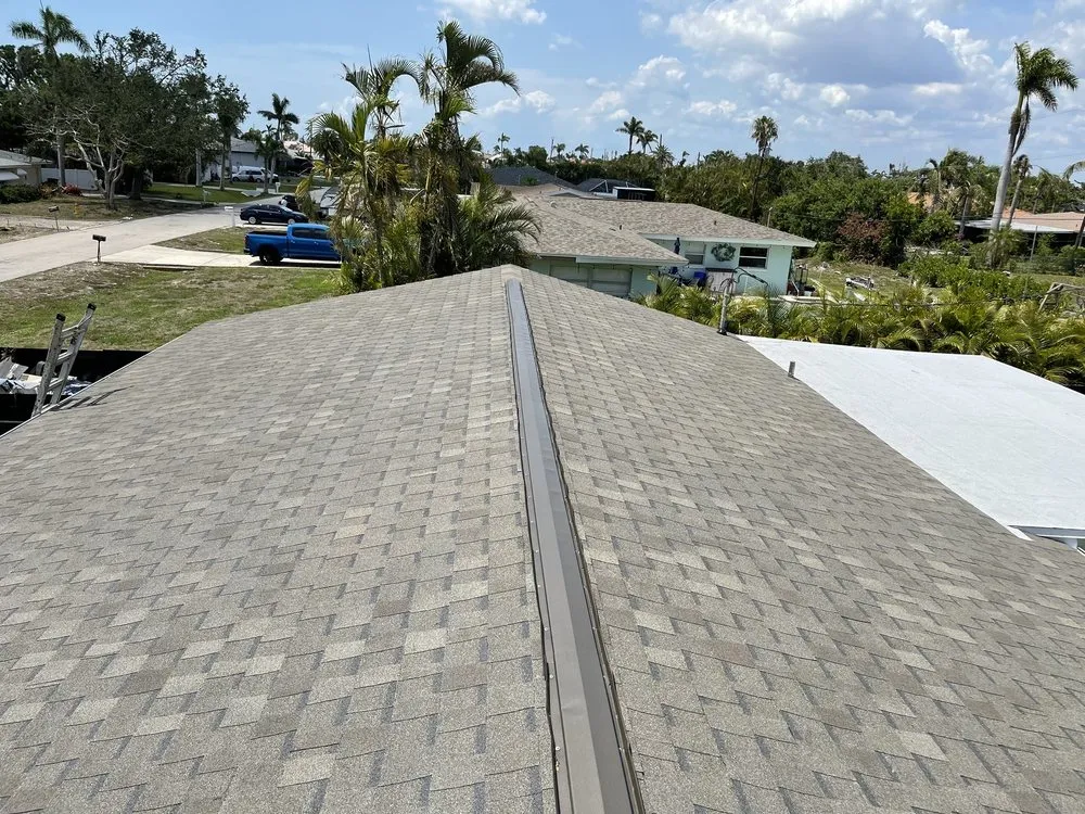 Slide of Lee County Roofing