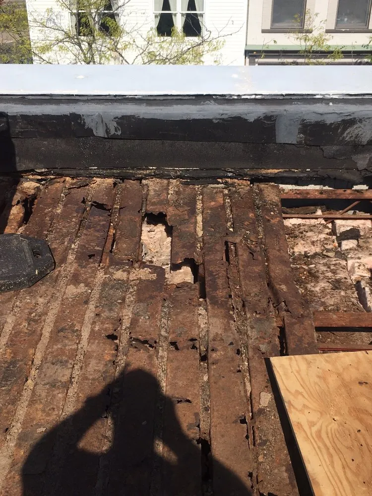 Slide of Lee Roofing