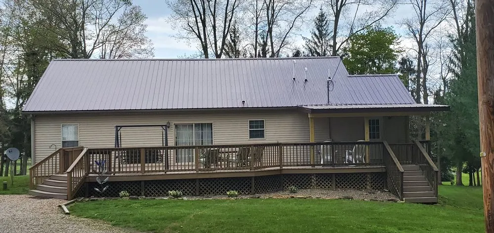 Slide of Lee's Roofing