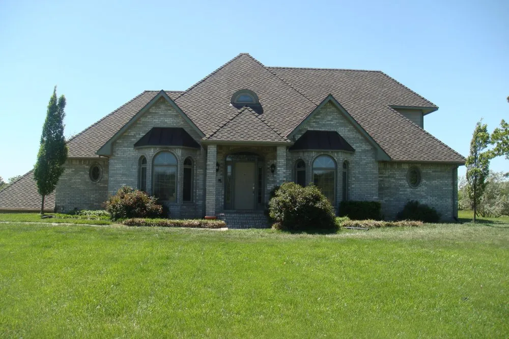 Slide of Lee's Roofing