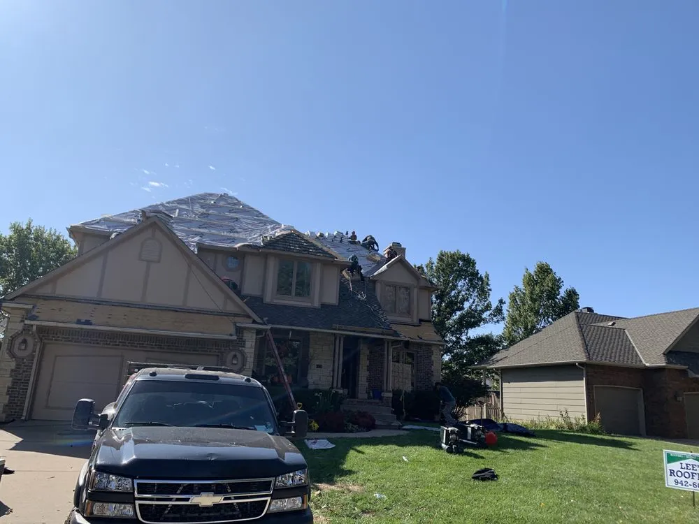 Slide of Lee's Roofing