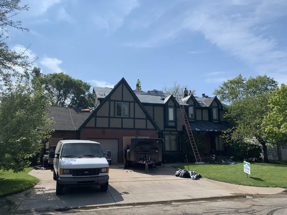 Slide of Lee's Roofing