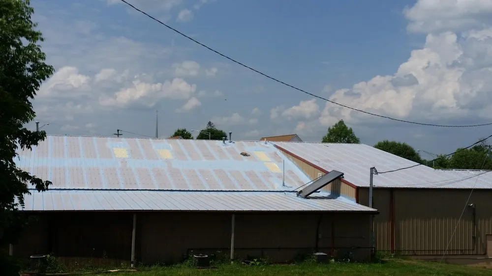 Slide of Lees Top Choice Roofing