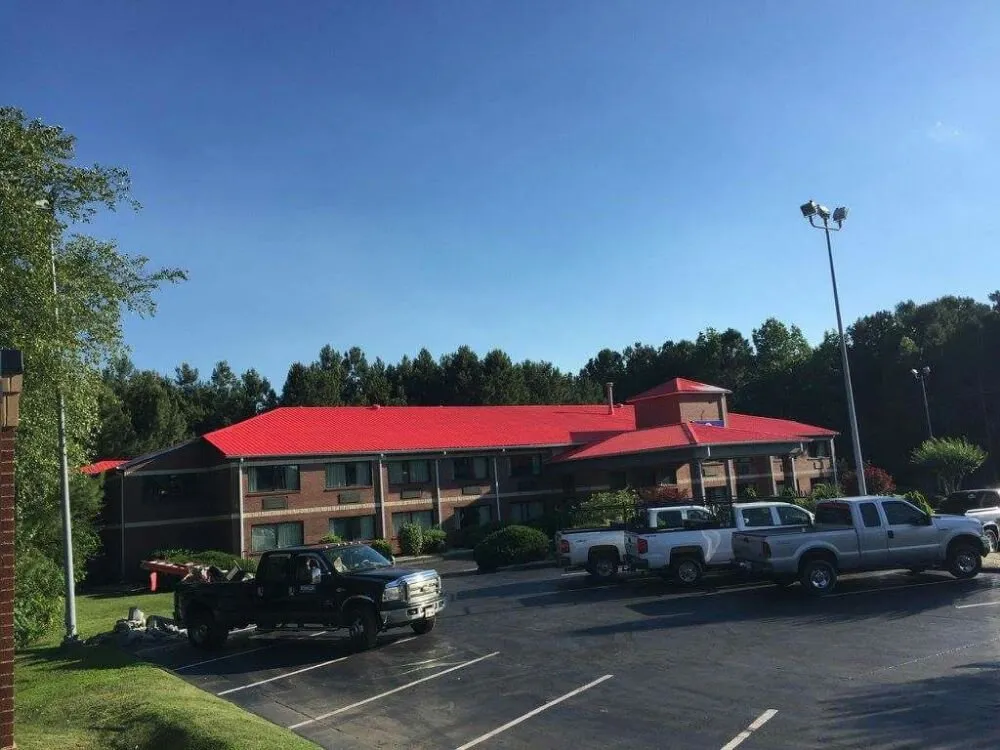 Slide of Lees Top Choice Roofing