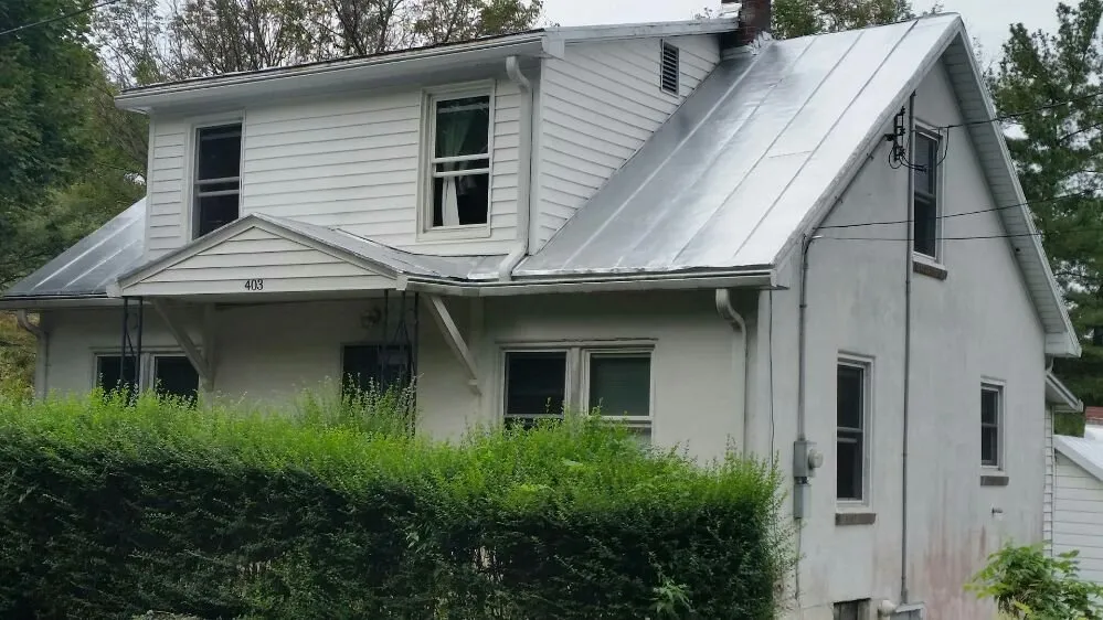 Slide of Lees Top Choice Roofing