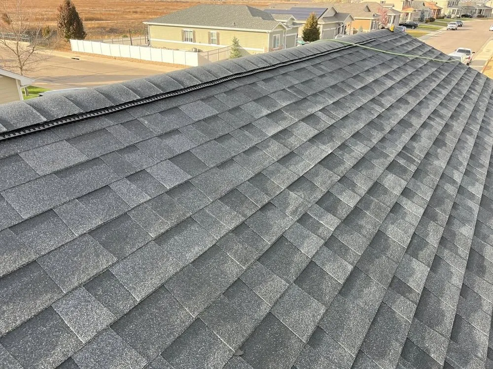 Slide of Legacy Roofers