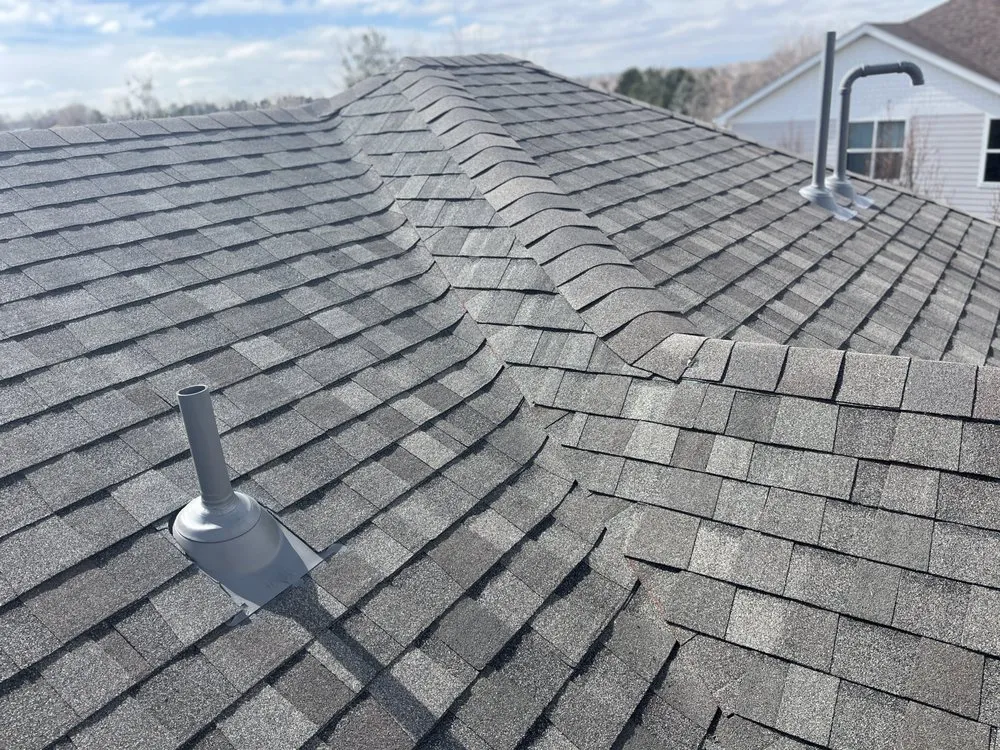 Slide of Legacy Roofers