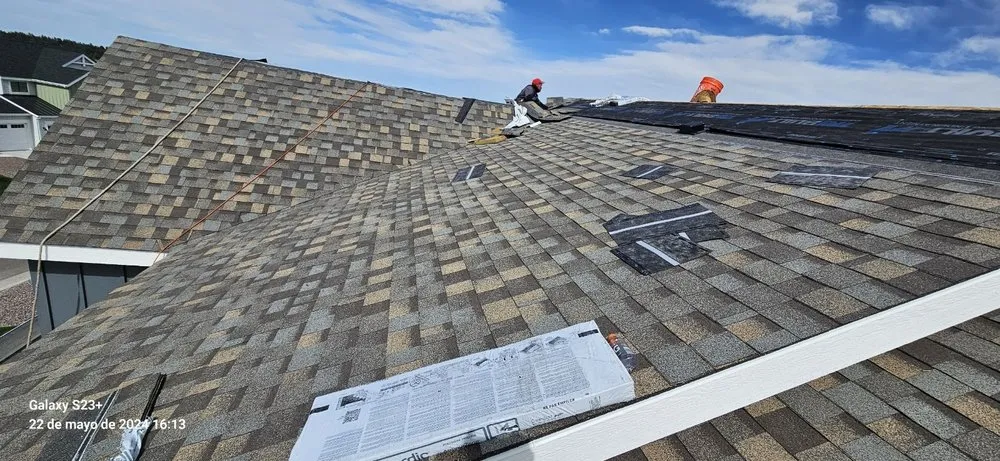 Slide of Legacy Roofing