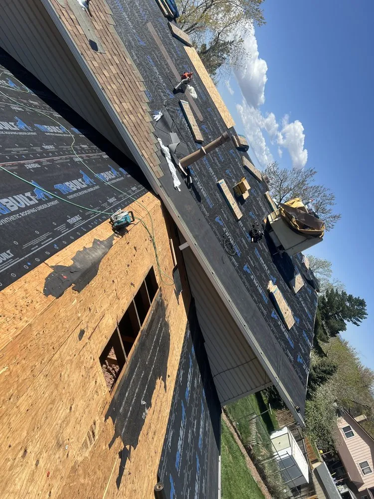 Slide of Legacy Roofing