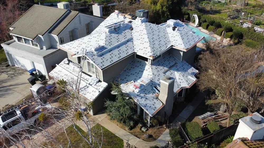 Slide of Legend Roofing Company