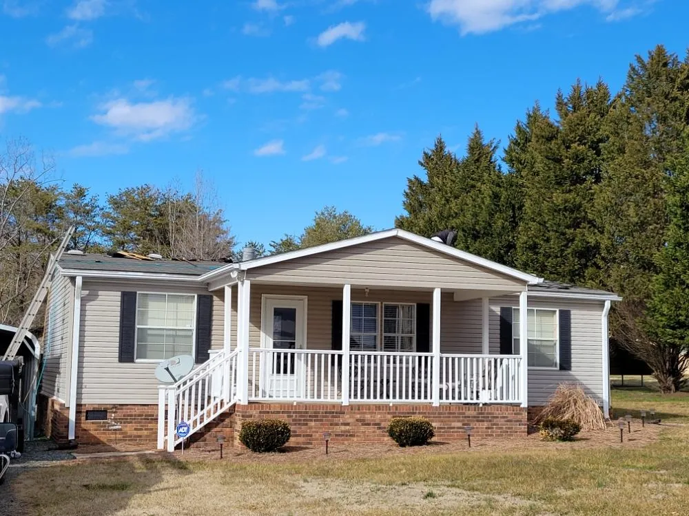 Licensed flat roof repair after storm damage across Winston-Salem, NC - Legends Builders