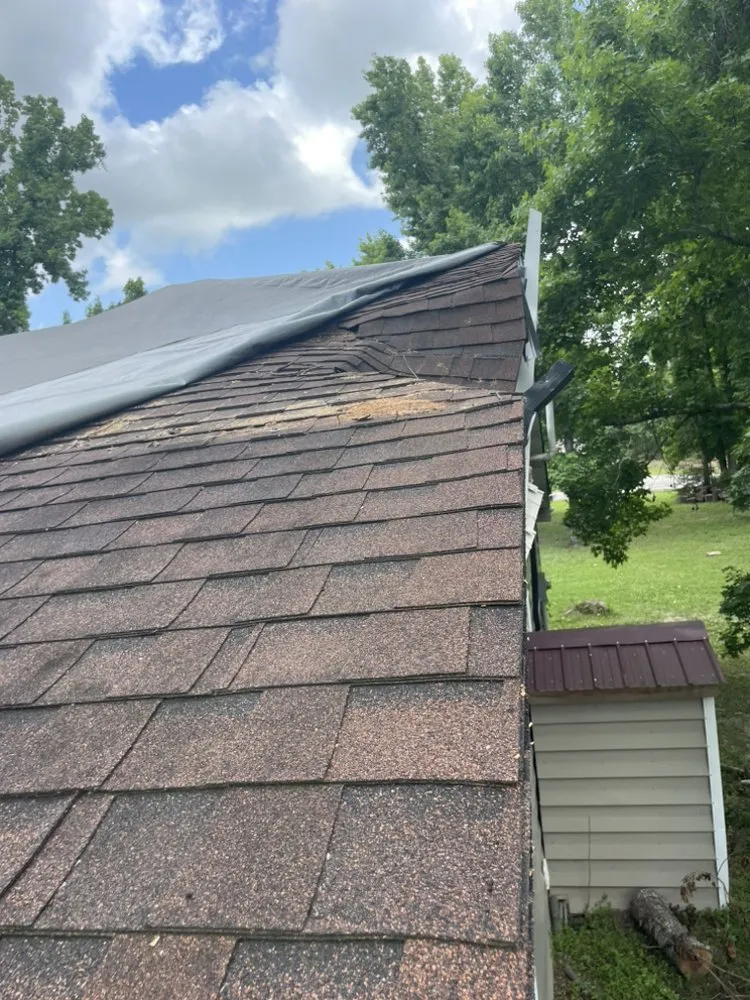 Slide of Leger’s Roofing & Con