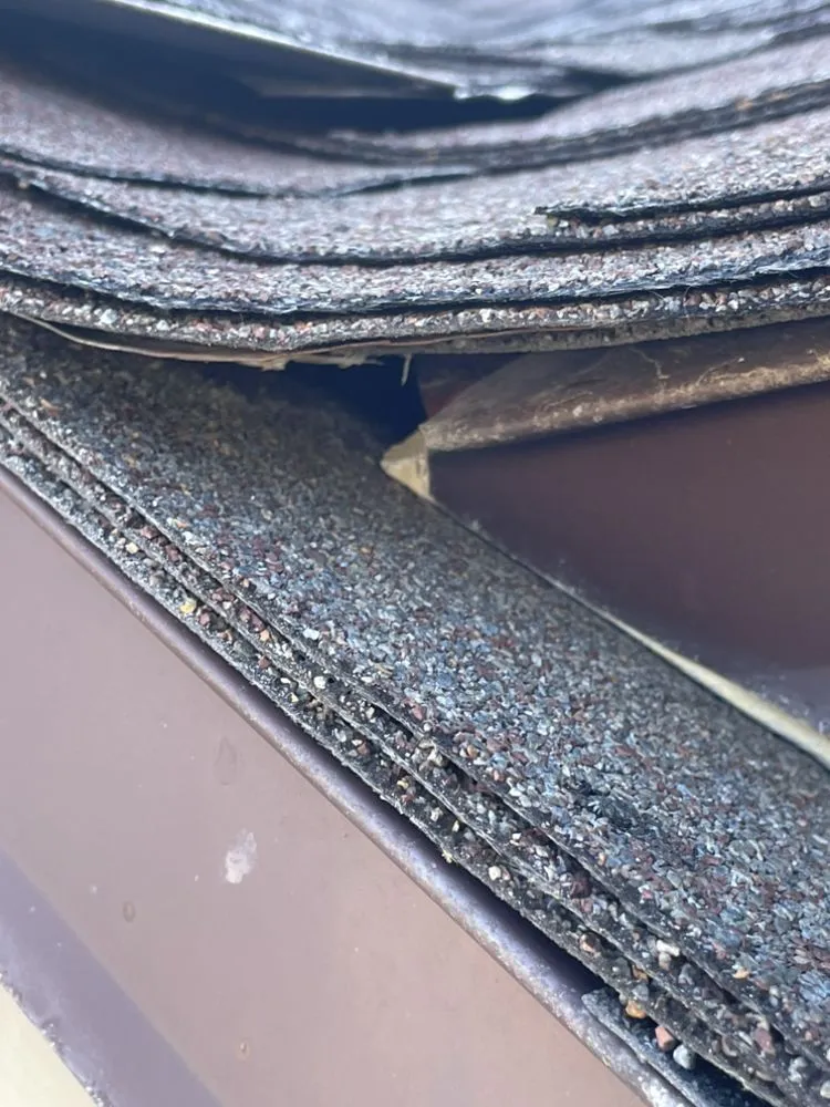 Slide of Leger’s Roofing and Construction