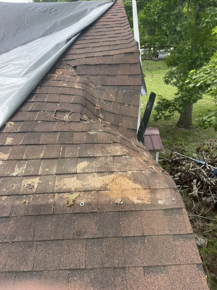 Slide of Leger’s Roofing and Construction