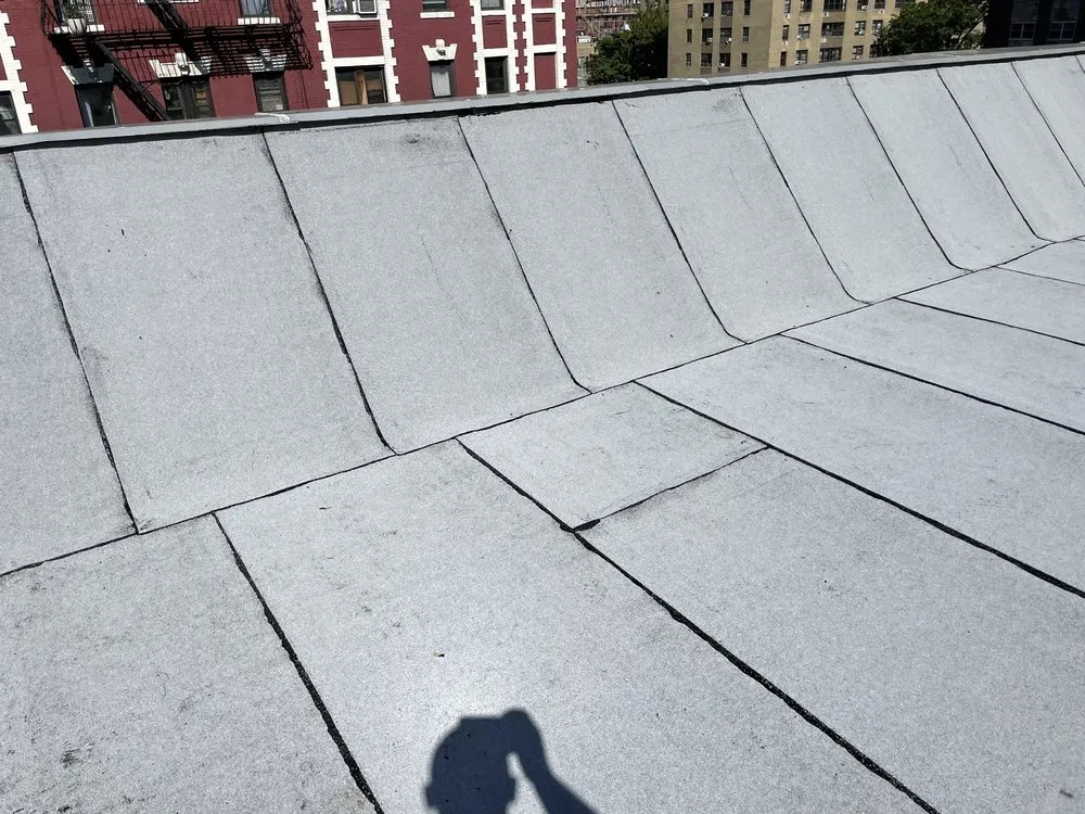 Slide of Lela Construction