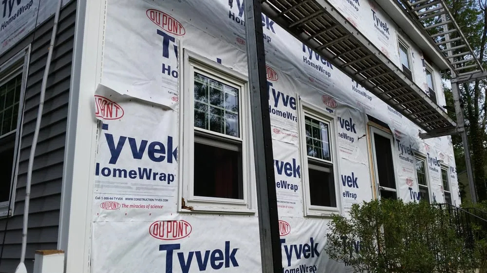 Slide of Leland Siding Windows & Roofing