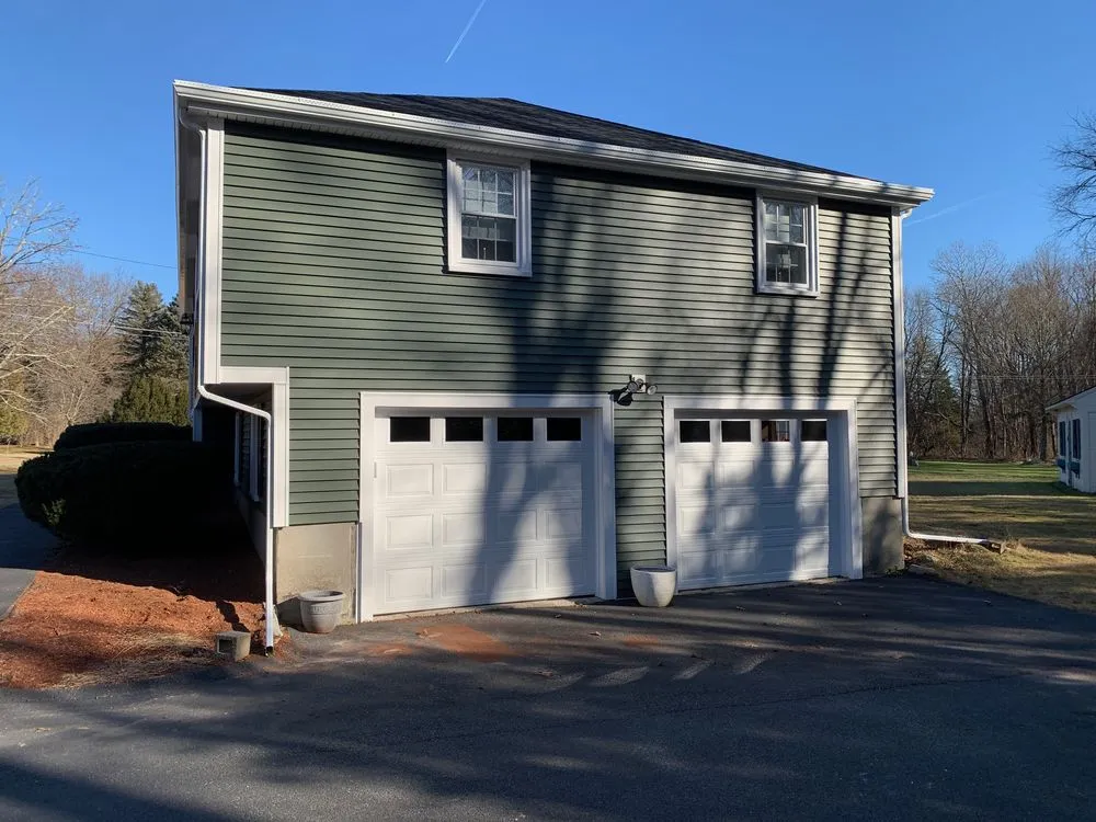 Slide of Leland Siding Windows & Roofing