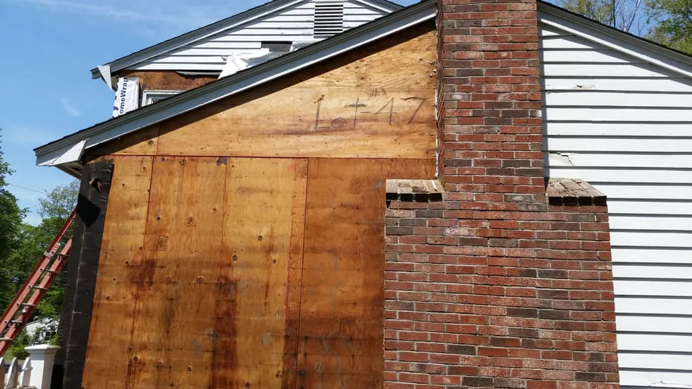 Slide of Leland Siding Windows & Roofing