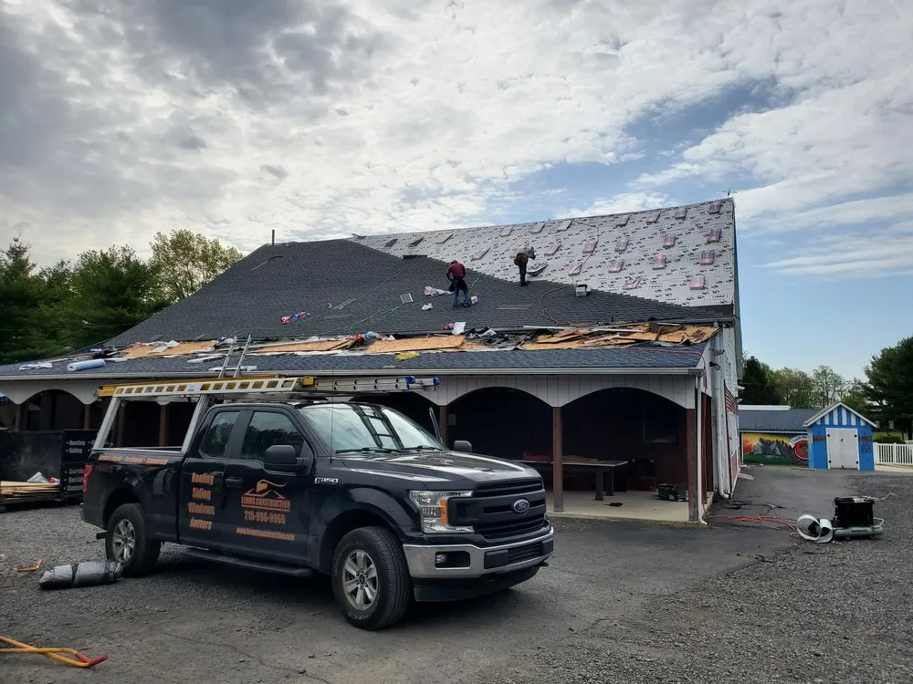 Slide of Lemus Construction