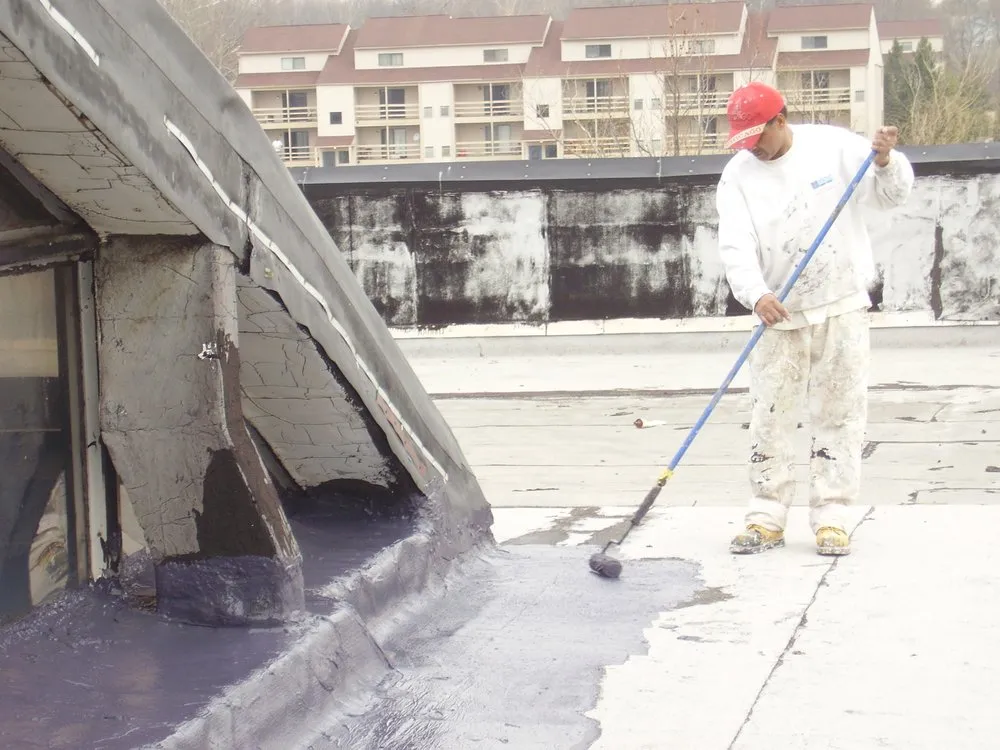 Slide of Len the Roofer - The Roof Coating Experts