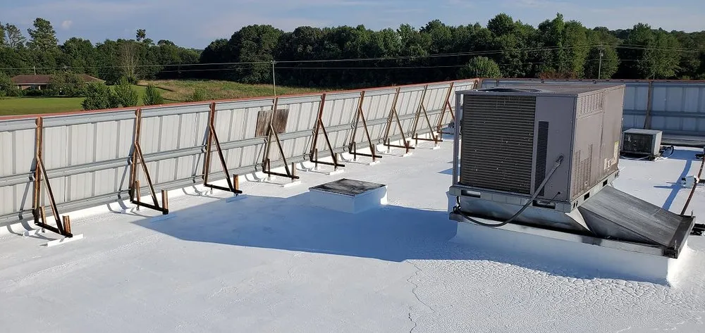 Slide of Len the Roofer - The Roof Coating Experts