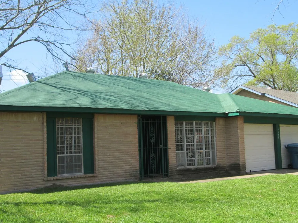 Slide of Len the Roofer - The Roof Coating Experts