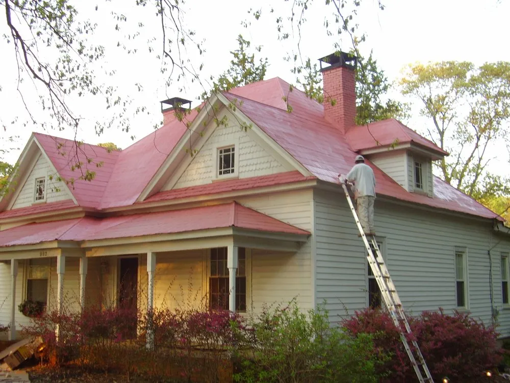 Slide of Len the Roofer - The Roof Coating Experts