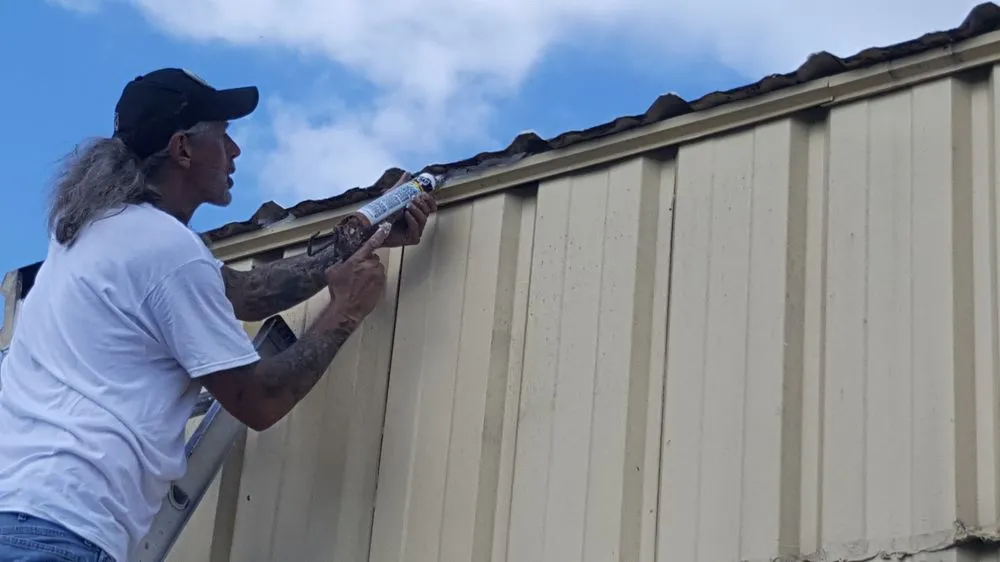 Slide of Len the Roofer - The Roof Coating Experts