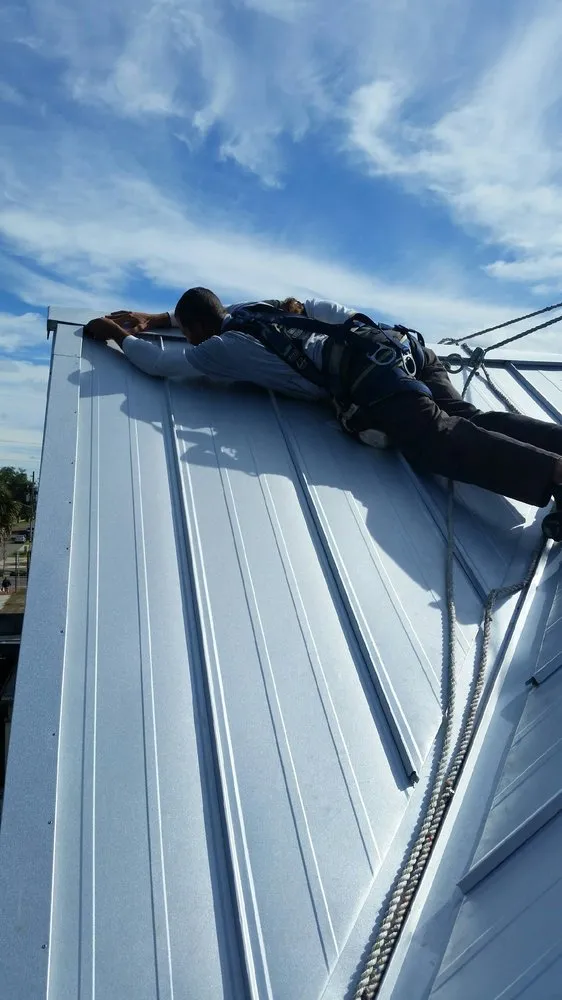 Slide of Lens Reroofing and Repairs