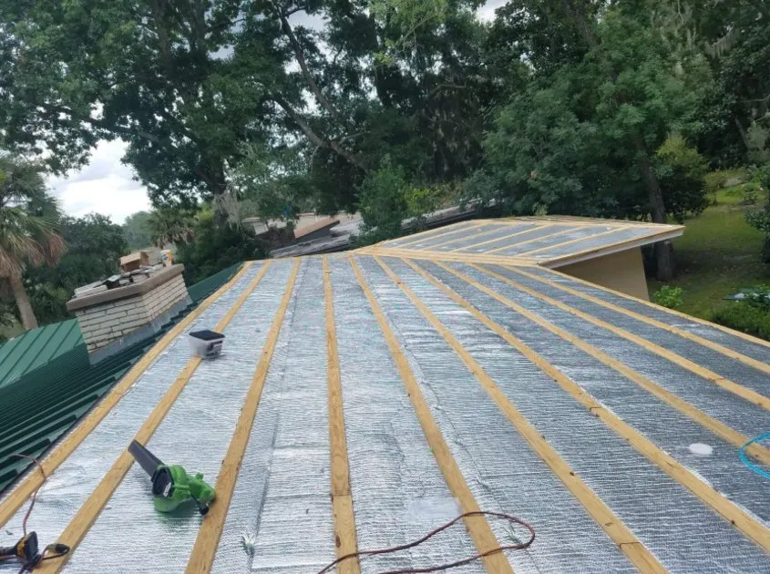 Slide of Lens Reroofing and Repairs