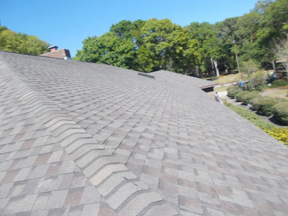 Slide of Len's Roofing