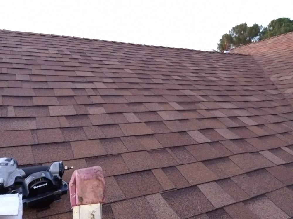 Slide of Leon Extreme Roofing