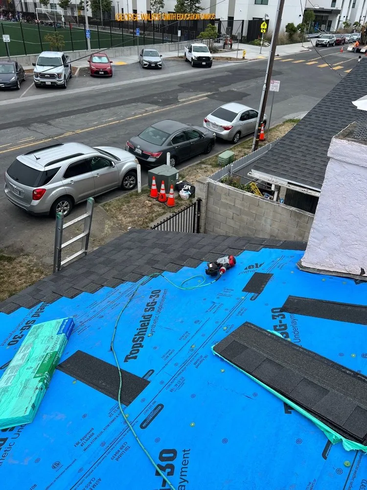 Slide of Leon K Miller Roofing