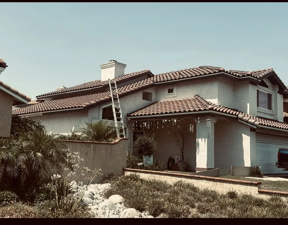 Slide of Leon K Miller Roofing