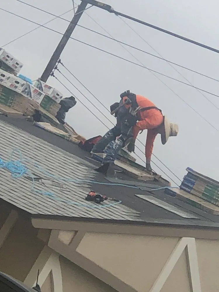 Slide of Leon K Miller Roofing