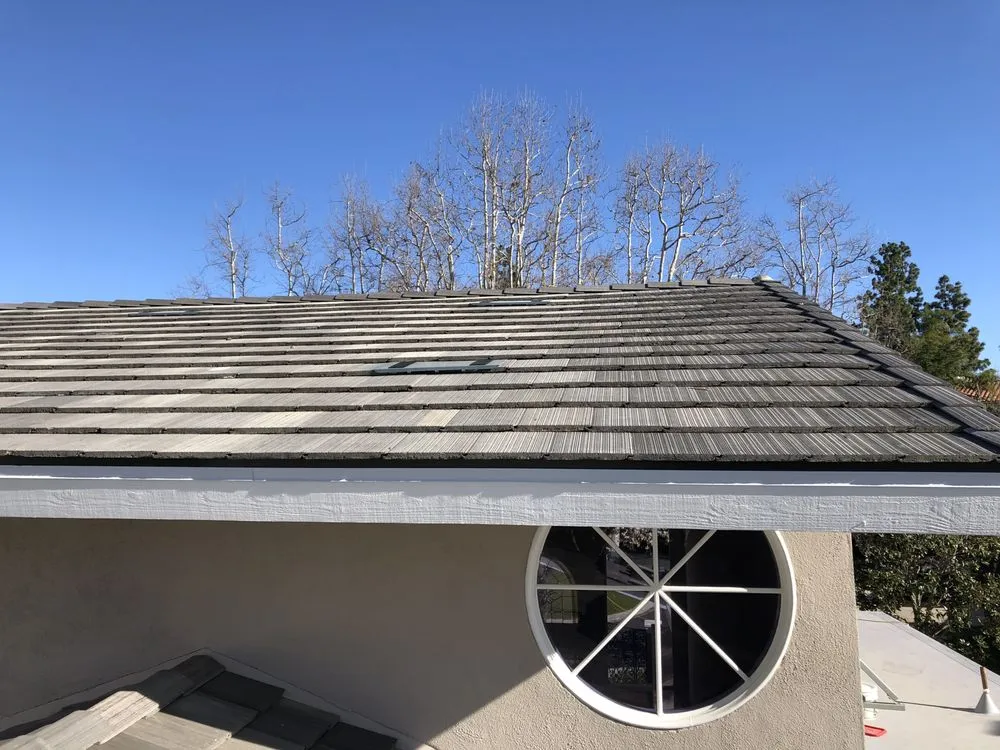 Slide of Leon K Miller Roofing