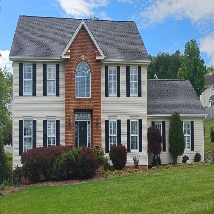 Slide of Leonard Roofing