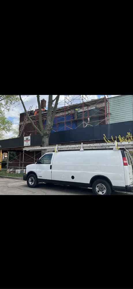 Slide of Leo's Roofing & Masonry